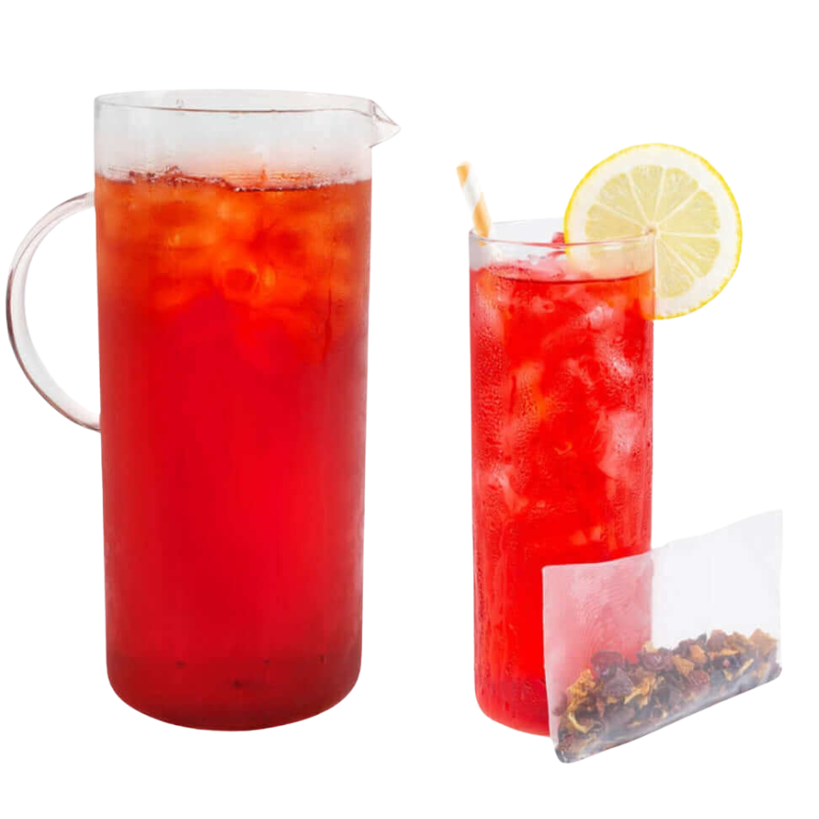 Blood Orange Hibiscus Iced Tea Red iced tea with lemon wedge and tea bag on a white background