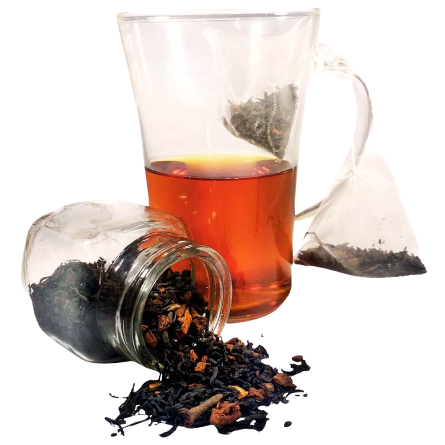 Glass teapot with tea leaves and a glass of black tea on a white background