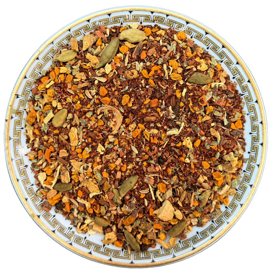 Spice mix on a decorative plate with a white background