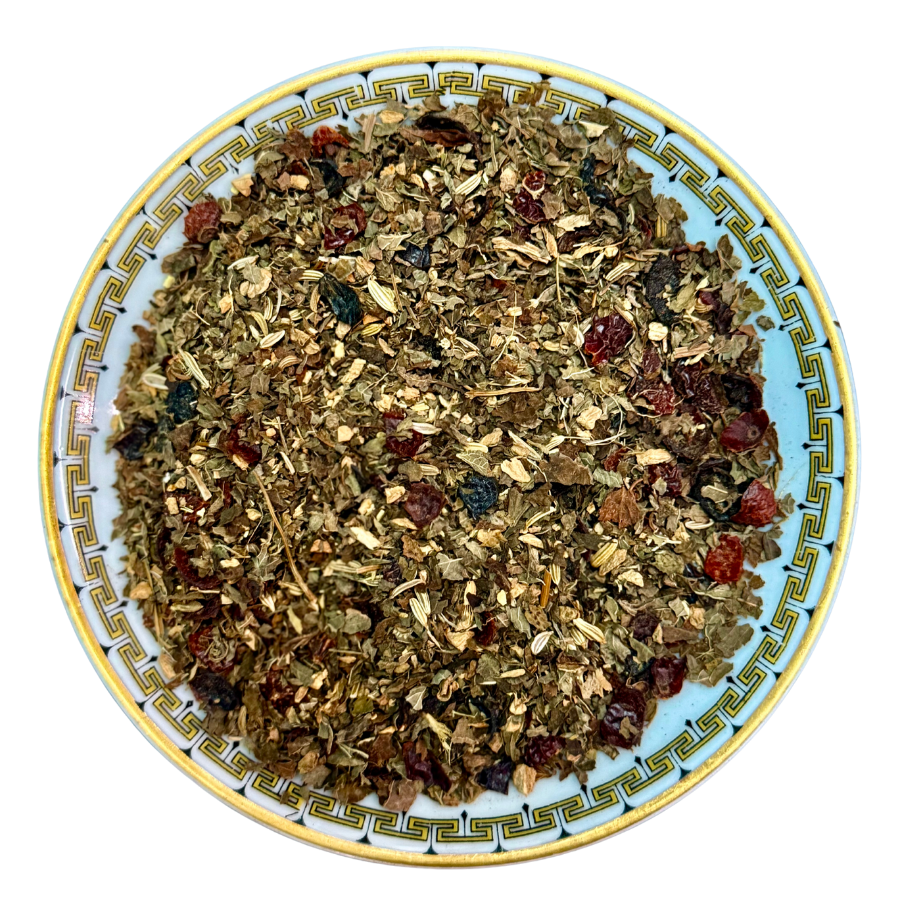 Tea blend on a decorative plate with a white background