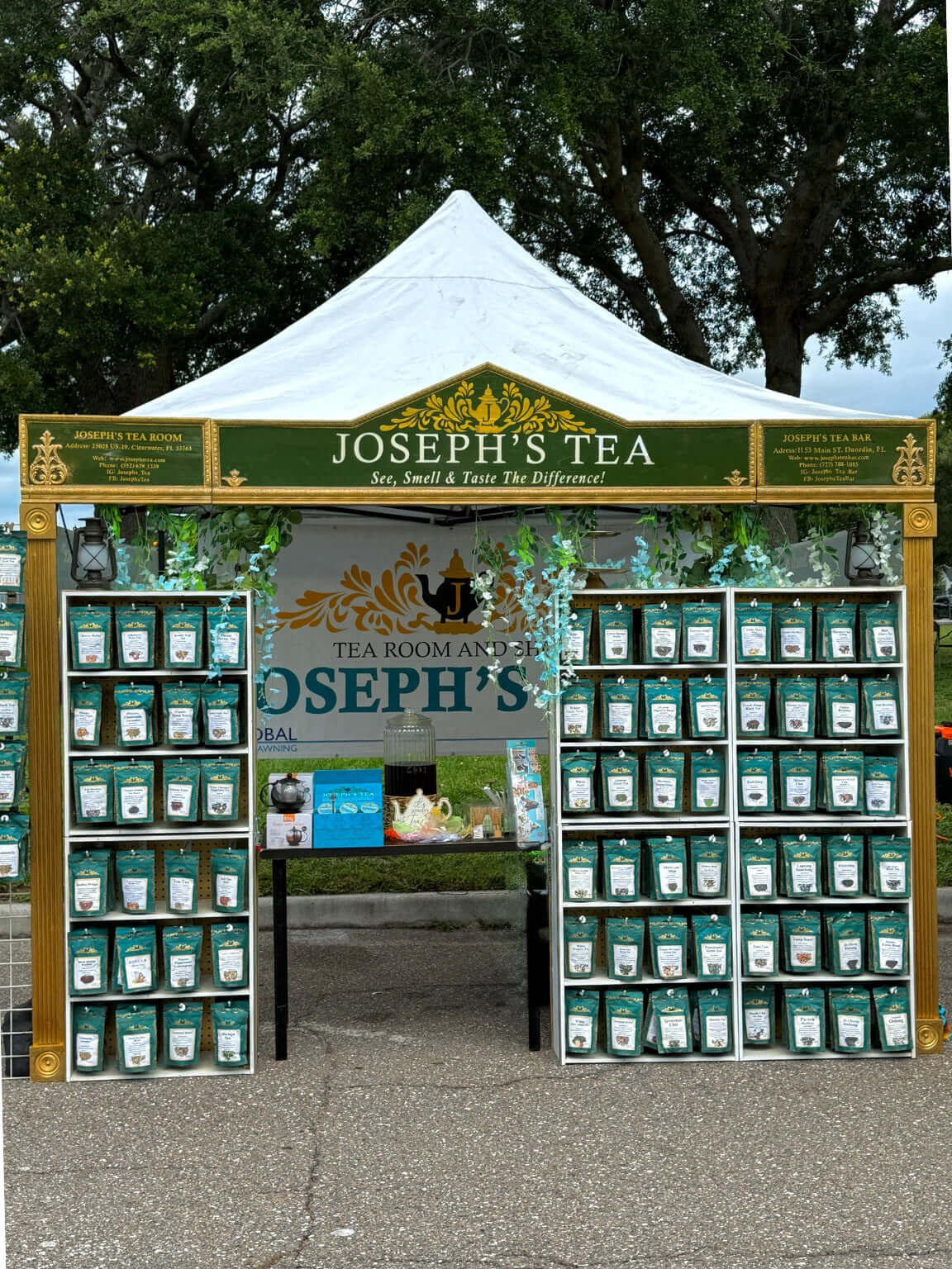 Joseph's Tea display stand with tea bags and branding.