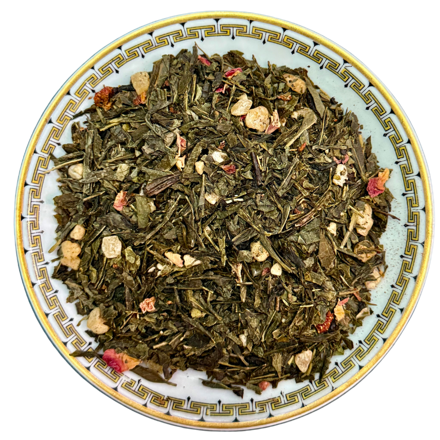 Tea leaves on a decorative ceramic plate with intricate patterns