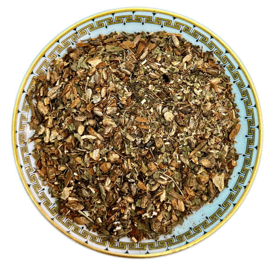 Herbal mix on a decorative plate with a white background
