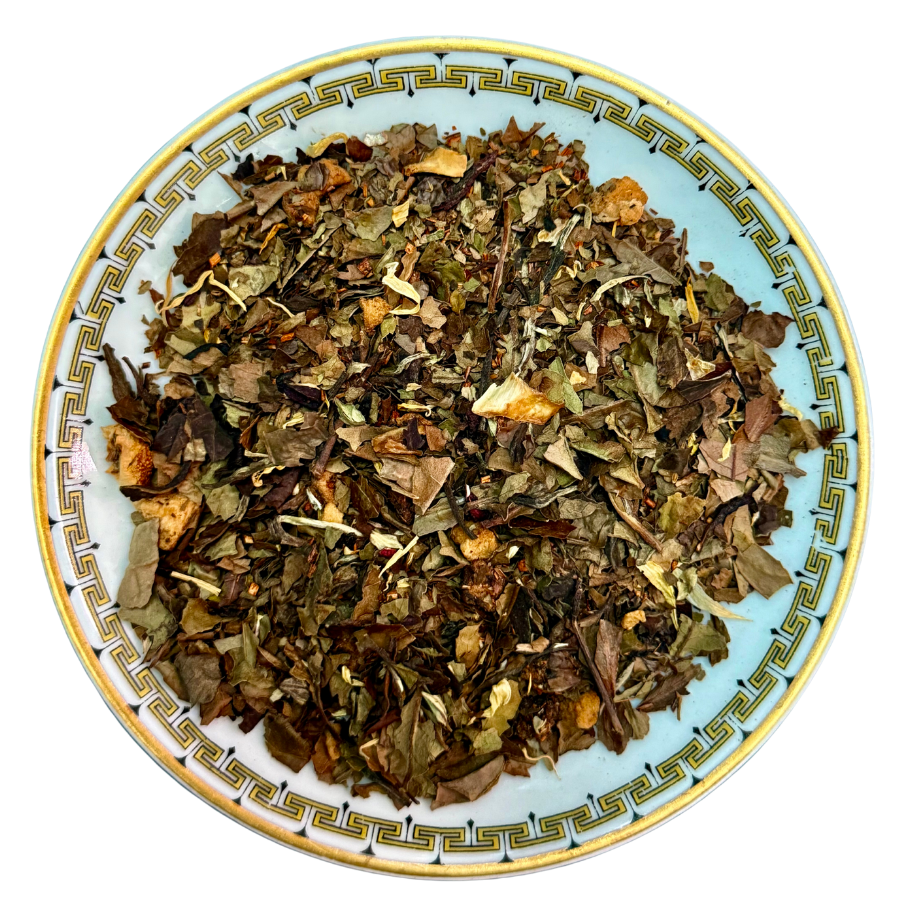Herbal tea leaves on a decorative ceramic plate